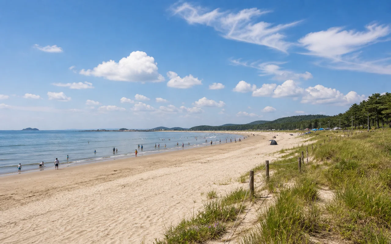 Taean Sinduri Beach and wide sandy beach under the summer sky