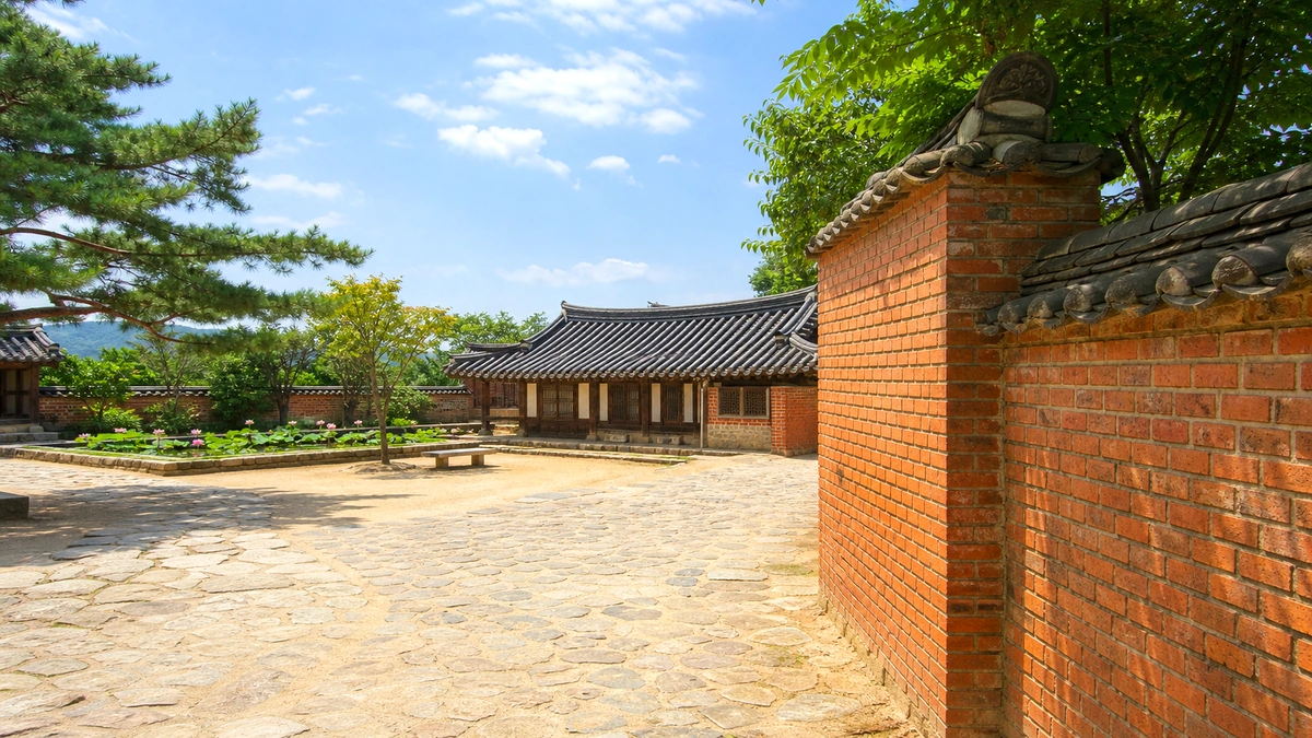 오후 빛의 벽돌 유산과 꽃길